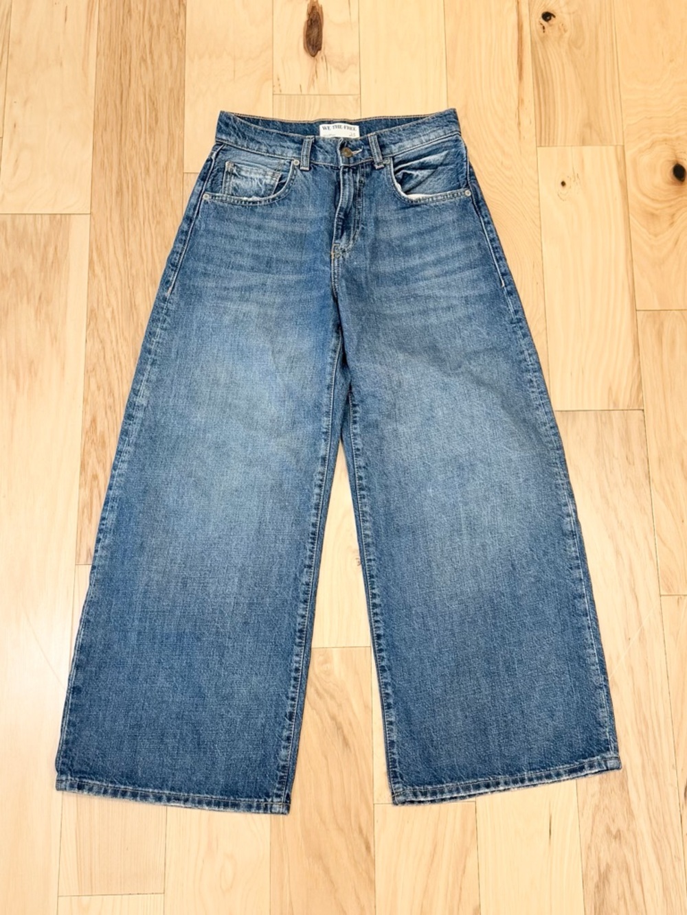 We The Free Wide Leg Flared Jeans in Medium Blue Denim